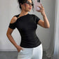 Solid hollow out metal decorated top in black