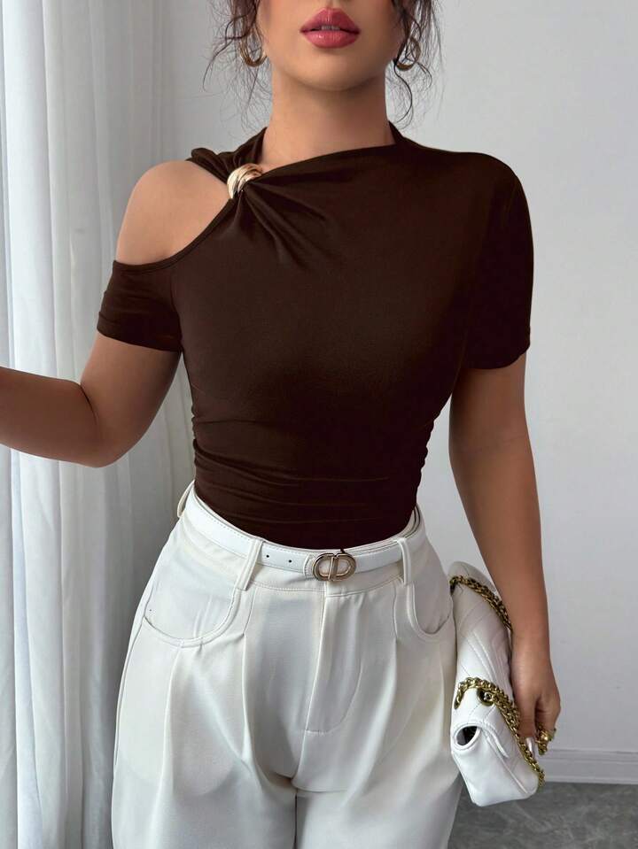 Solid hollow out metal decorated top in brown