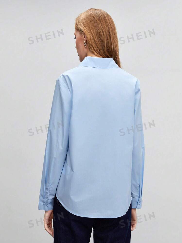 Solid long sleeve button down shirt in blue