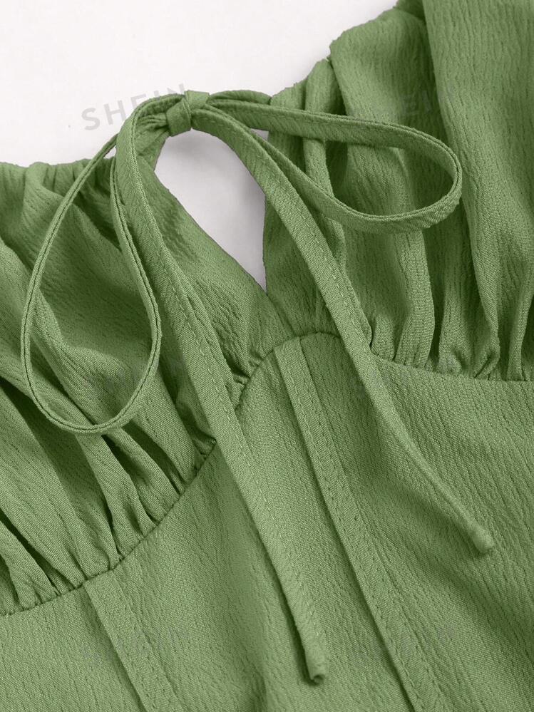 Solid pleated front tie strap dress in green