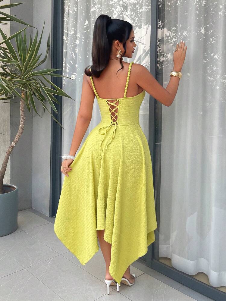 Spaghetti strap asymmetric hem tie back dress in green