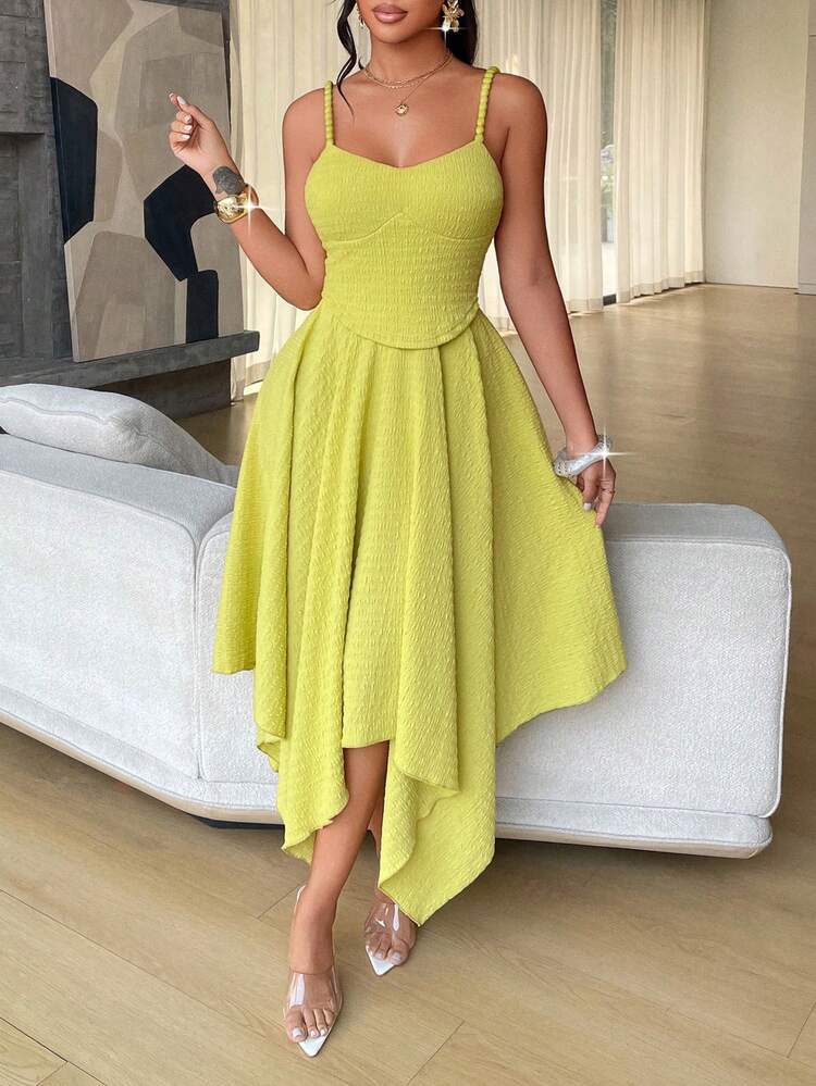 Spaghetti strap asymmetric hem tie back dress in green