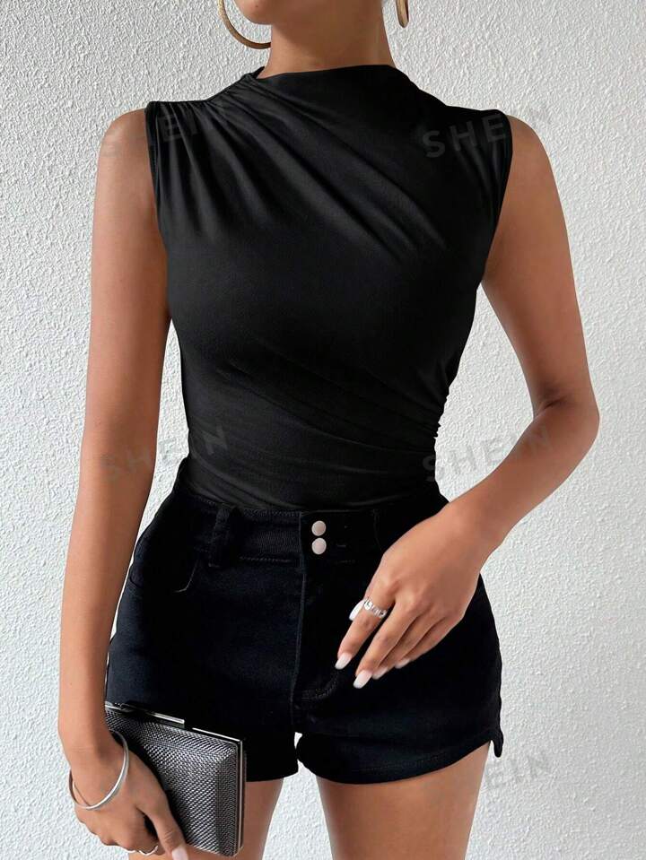 Turtleneck sleeveless bodysuit in black