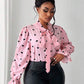 Heart shaped tie detail blouse in pink