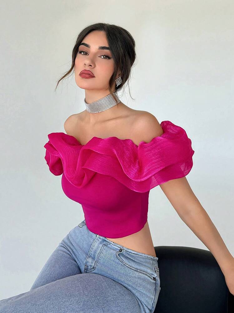 Off shoulder ruffle trim crop top in pink