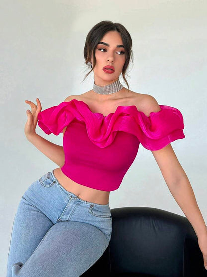 Off shoulder ruffle trim crop top in pink