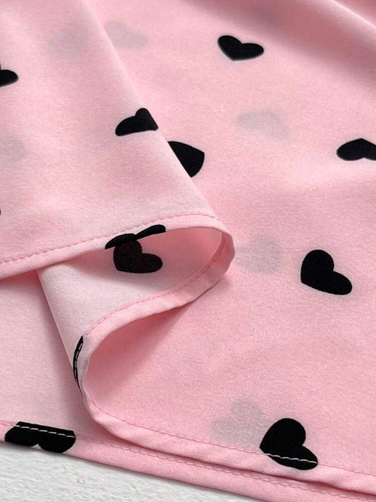 Heart shaped tie detail blouse in pink