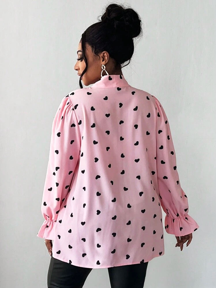 Heart shaped tie detail blouse in pink